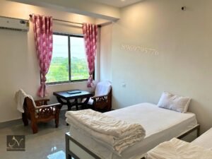 Spacious comfortable AC room with city view for two with free breakfast Hotel Nalanda guest house rajgir