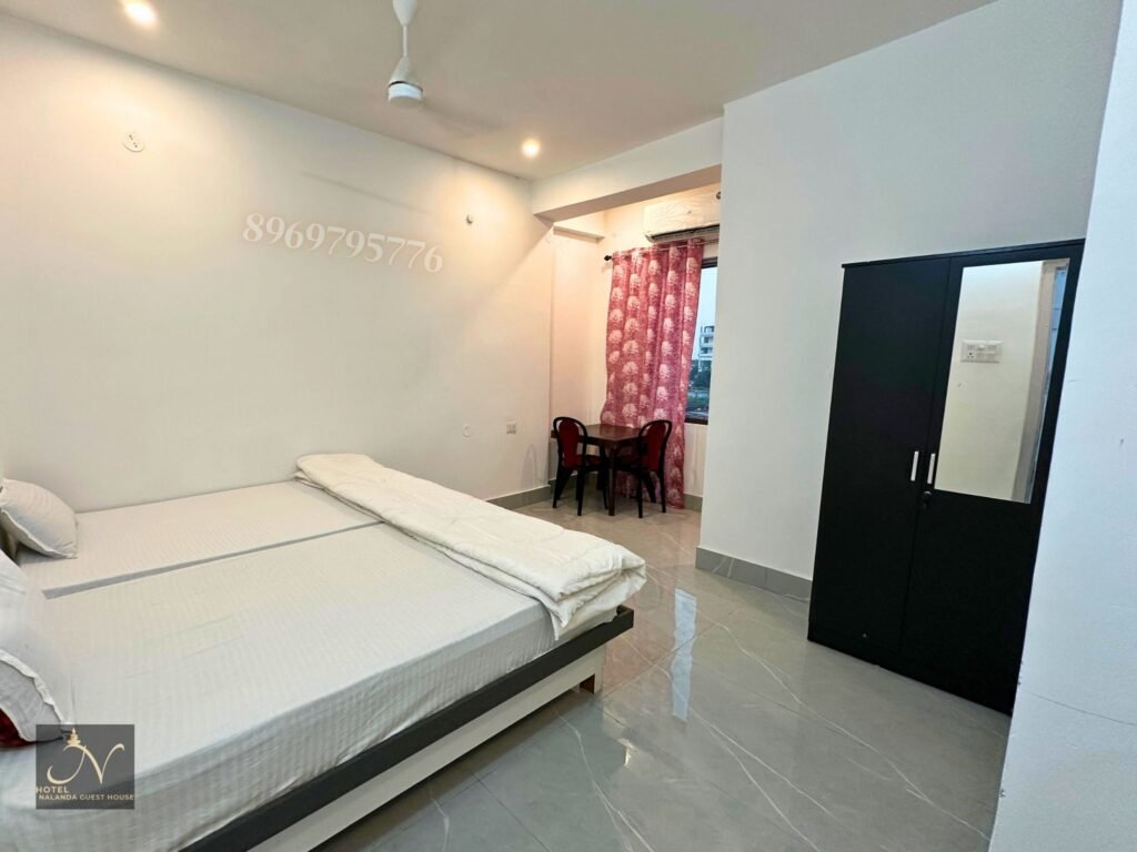 Spacious comfortable room for two with free breakfast Hotel Nalanda guest house rajgir